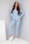 Niebieski dopasowany komplet RÓŻA  włoskiej produkcji, bluzka z różą 3d na rękawie i legginsami. Prążkowany materiał z wiskozy. casual set, basic. Idealne dopasowanie do sylwetki i jej podkreślenie. Komplet można urozmaicić marynarką lub kurtką.