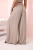 Modne spodnie beżowe z wiskozy, gumka w pasie. Przewiewny materiał. Szeroka nogawka typu wide leg. Luźne, lekkie,eleganckie, zwiewne, komfort, swoboda ruchów produkt włoski  Baza do wielu stylizacji Smart casual, comfy wear, basic, bestseller hit sezonu