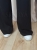 komplet dresowy damski wykonany z miękkiego materiału masełko, bluza oraz spodnie z szeroką nogawką wide leg, komfort, wygoda i styl w jednym. Klasyczna czerń podkreślająca kobiecość i elegancję
